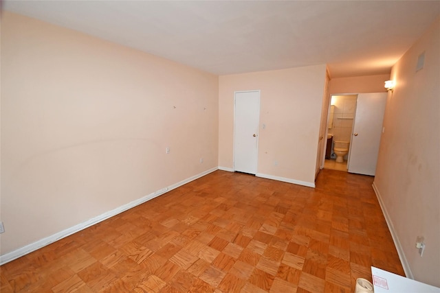 10 Ipswich Ave Unit 4M, Great Neck, NY 11021 - unfurnished room featuring baseboards