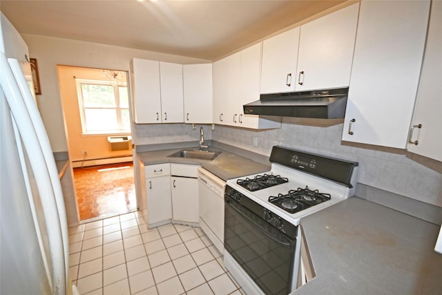 10 Ipswich Ave Unit 4M, Great Neck, NY 11021 - kitchen featuring under cabinet range hood, white appliances, a baseboard heating unit, white cabinets, and backsplash