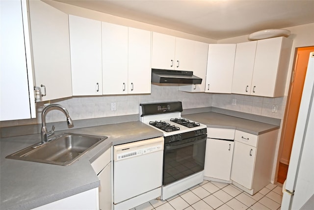 10 Ipswich Ave Unit 4M, Great Neck, NY 11021 - kitchen featuring white appliances, under cabinet range hood, white cabinetry, and decorative backsplash