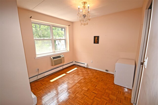 10 Ipswich Ave Unit 4M, Great Neck, NY 11021 - spare room featuring a chandelier, a wall mounted AC, and a baseboard heating unit
