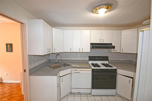 10 Ipswich Ave Unit 4M, Great Neck, NY 11021 - kitchen featuring gas range, white dishwasher, under cabinet range hood, white cabinetry, and decorative backsplash