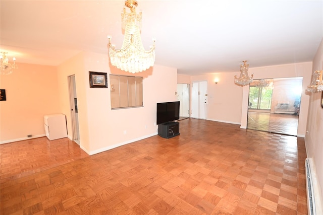 10 Ipswich Ave Unit 4M, Great Neck, NY 11021 - unfurnished living room with a chandelier and a baseboard radiator
