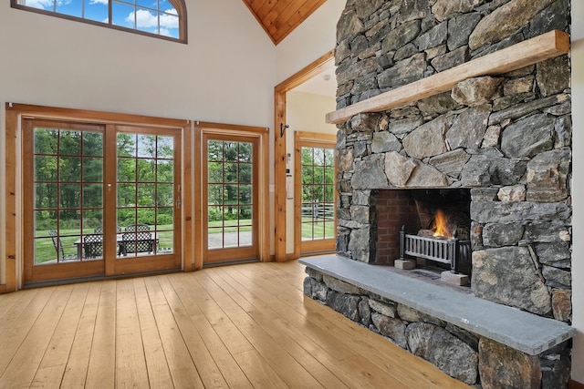 6843 Rte 55, Wingdale, NY 12594 - doorway featuring hardwood / wood-style floors, a stone fireplace, and high vaulted ceiling