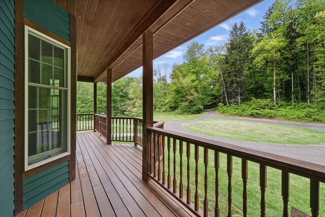 6843 Rte 55, Wingdale, NY 12594 - wooden deck with covered porch and a yard