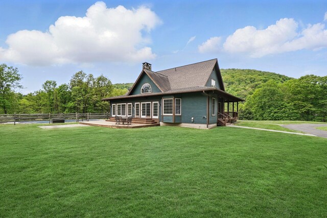6843 Rte 55, Wingdale, NY 12594 - rear view of house with a chimney, a forest view, a deck, and a shingled roof