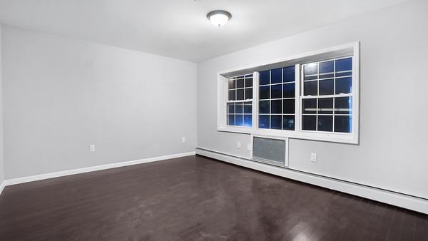 2040 Washington Ave, Bronx, NY 10457 - spare room with baseboard heating and baseboards