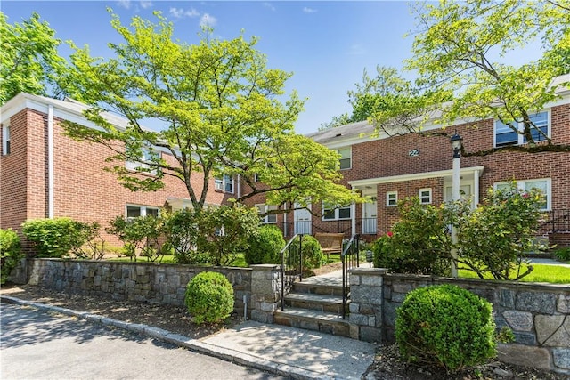 multi unit property featuring brick siding