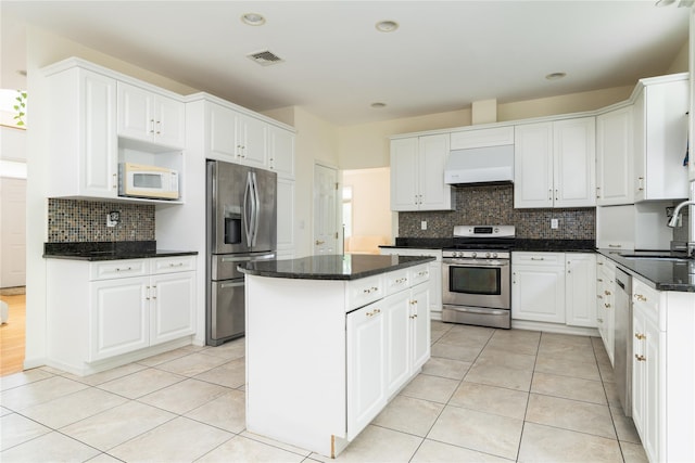 9 Golf Course Dr, Suffern, NY 10901 - kitchen featuring appliances with stainless steel finishes, a sink, wall chimney exhaust hood, a kitchen island, and backsplash