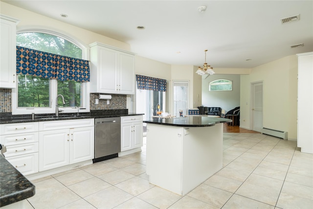 9 Golf Course Dr, Suffern, NY 10901 - kitchen featuring dishwasher, a sink, a baseboard heating unit, backsplash, and white cabinetry