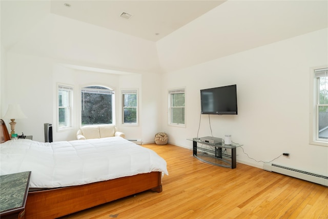 9 Golf Course Dr, Suffern, NY 10901 - bedroom with light wood-type flooring and a baseboard heating unit