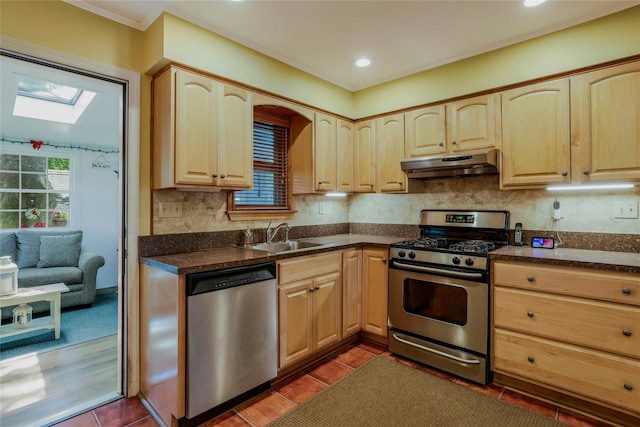 1784 W End Ave, New Hyde Park, NY 11040 - kitchen featuring stainless steel appliances, under cabinet range hood, a sink, light brown cabinetry, and crown molding