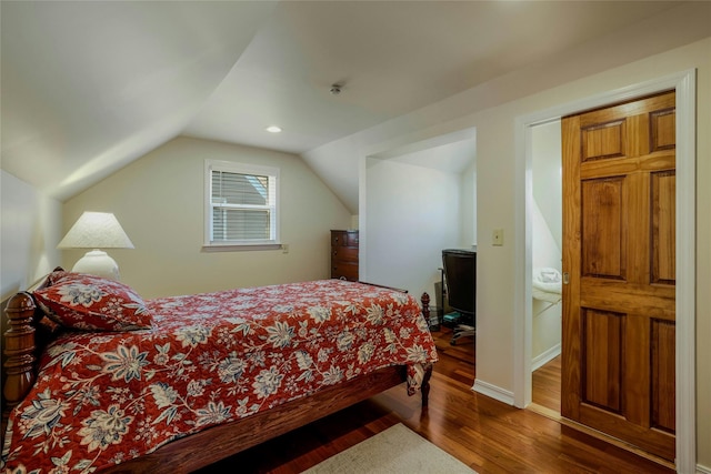 1784 W End Ave, New Hyde Park, NY 11040 - bedroom featuring dark wood-style flooring and vaulted ceiling