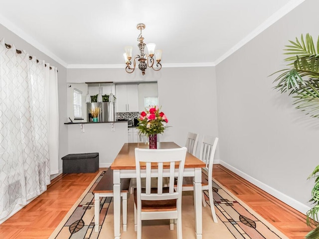4428 Bruner Ave, Bronx, NY 10466 - dining room with a chandelier, ornamental molding, and baseboards