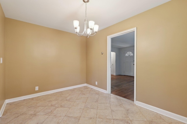 20 Ravensdale Rd, Hastings-On-Hudson, NY 10706 - spare room with a chandelier and light tile patterned floors
