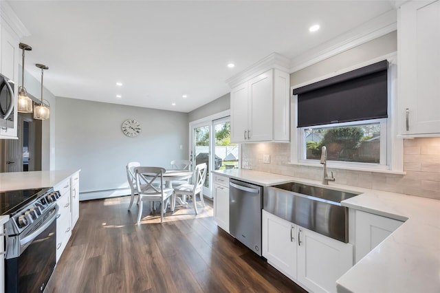 30 Twisting Dr, Lake Grove, NY 11755 - kitchen featuring stainless steel appliances, a sink, white cabinets, dark wood-style flooring, and decorative backsplash