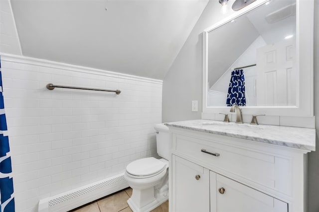 30 Twisting Dr, Lake Grove, NY 11755 - bathroom with a baseboard heating unit, vaulted ceiling, toilet, vanity, and a shower with curtain