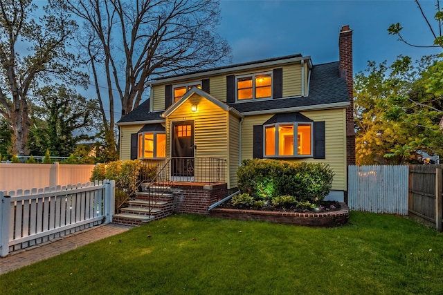 21 Livingston St, Deer Park, NY 11729 - traditional home featuring a chimney and a shingled roof