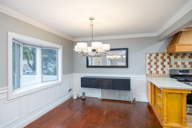 21 Livingston St, Deer Park, NY 11729 - dining area featuring a chandelier, ornamental molding, radiator, wood finished floors, and a decorative wall