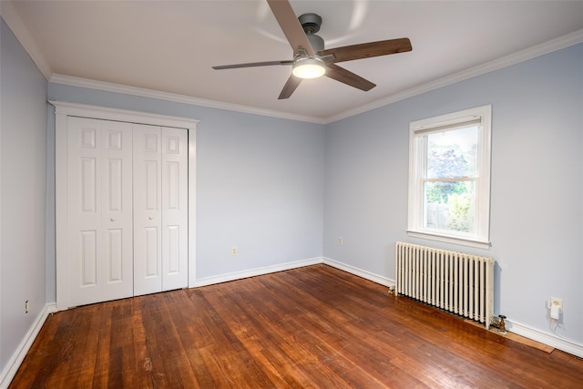 21 Livingston St, Deer Park, NY 11729 - unfurnished bedroom featuring radiator, wood finished floors, ornamental molding, baseboards, and a closet