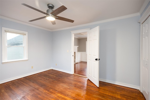 21 Livingston St, Deer Park, NY 11729 - unfurnished bedroom featuring wood finished floors, crown molding, baseboards, ceiling fan, and a closet