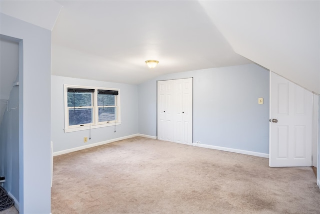 21 Livingston St, Deer Park, NY 11729 - bonus room featuring carpet flooring, lofted ceiling, and baseboards