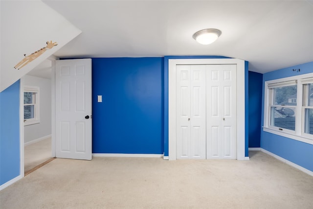 21 Livingston St, Deer Park, NY 11729 - unfurnished bedroom featuring carpet floors, baseboards, and a closet