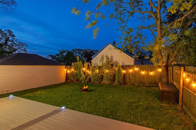21 Livingston St, Deer Park, NY 11729 - view of yard featuring a deck and an outdoor fire pit