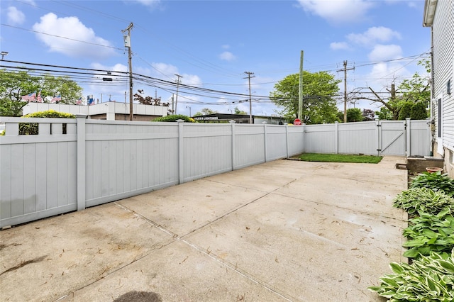 view of patio featuring a gate and a fenced backyard