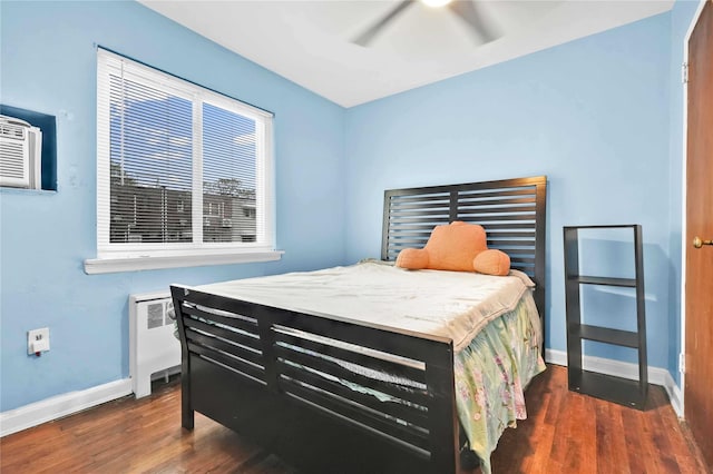 1141 E 213th St, Bronx, NY 10469 - bedroom with wood finished floors, baseboards, and a ceiling fan