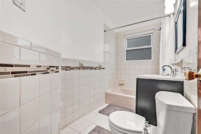 1141 E 213th St, Bronx, NY 10469 - bathroom with tile walls, toilet, shower / tub combo, tile patterned floors, and vanity