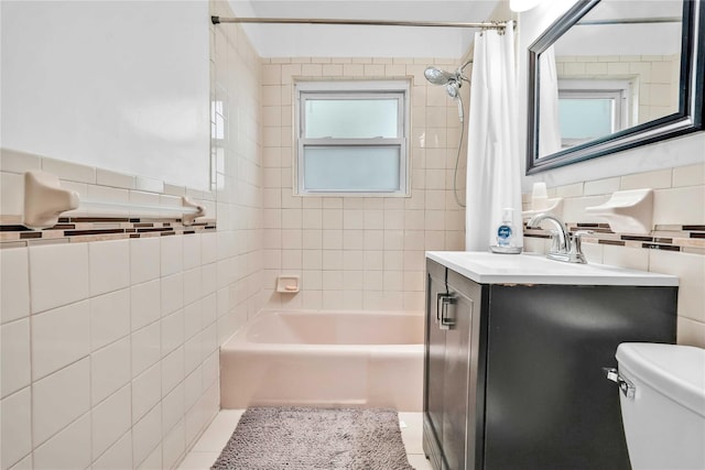 1141 E 213th St, Bronx, NY 10469 - bathroom with tile walls, shower / bath combination with curtain, toilet, and vanity