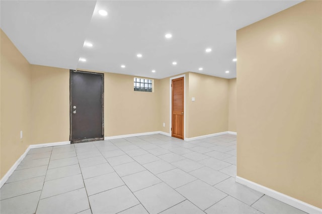 1141 E 213th St, Bronx, NY 10469 - basement featuring recessed lighting, baseboards, and light tile patterned floors