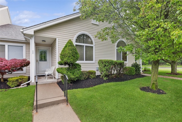 552 Birchwood Park Dr, Middle Island, NY 11953 - view of front facade with a front lawn