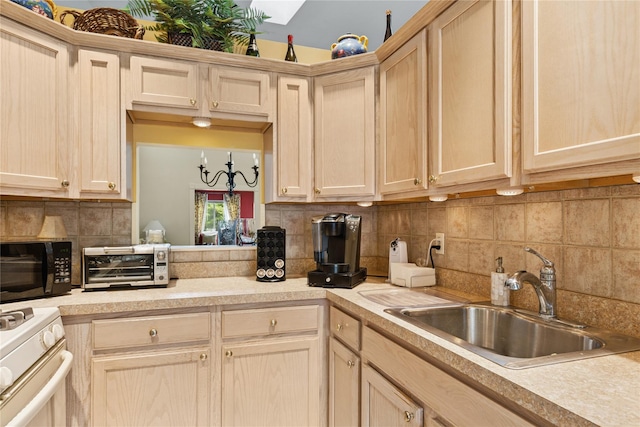 552 Birchwood Park Dr, Middle Island, NY 11953 - kitchen with a sink, light countertops, tasteful backsplash, and black microwave