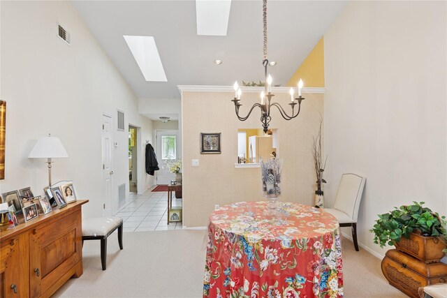 552 Birchwood Park Dr, Middle Island, NY 11953 - dining room with a skylight, a chandelier, baseboards, and light carpet