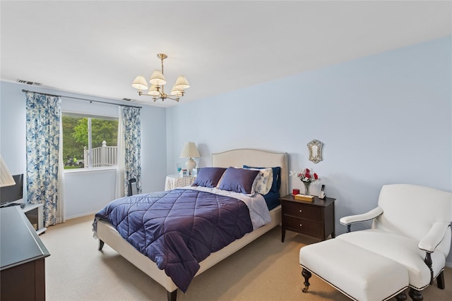 552 Birchwood Park Dr, Middle Island, NY 11953 - bedroom with a chandelier and light carpet