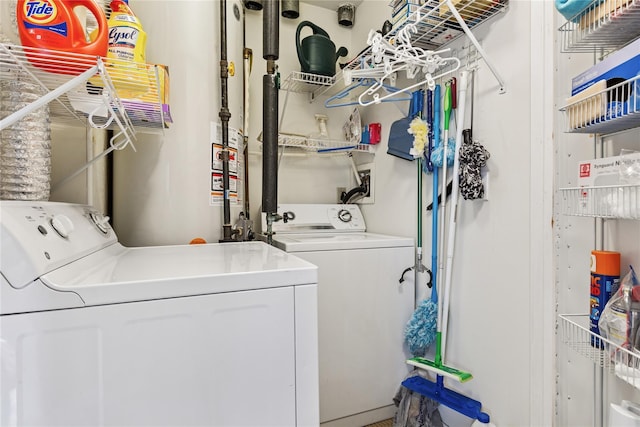 552 Birchwood Park Dr, Middle Island, NY 11953 - laundry room with separate washer and dryer and gas water heater