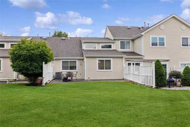 552 Birchwood Park Dr, Middle Island, NY 11953 - rear view of property featuring a patio area and roof with shingles