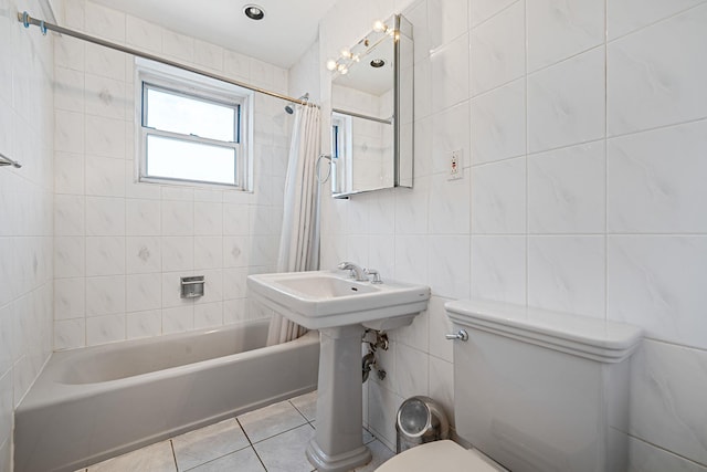 190 W Merrick Rd Unit 4E, Freeport, NY 11520 - full bath with tile walls, shower / bath combo, and tile patterned floors