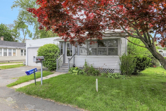 100 Harwich St, Kingston, NY 12401 - obstructed view of property featuring a front yard