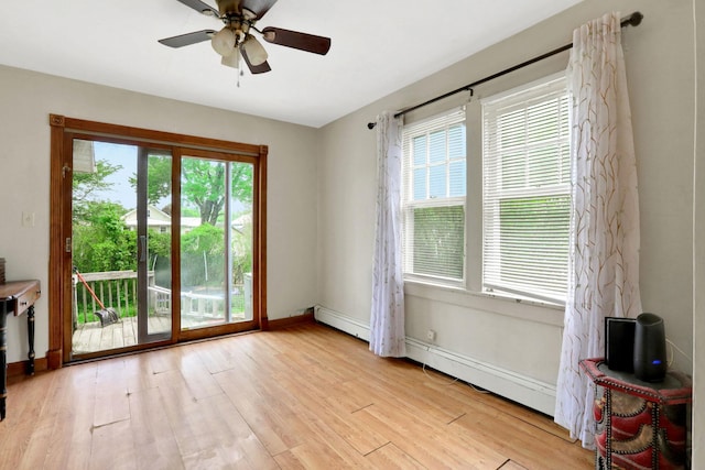100 Harwich St, Kingston, NY 12401 - empty room with light wood finished floors, a ceiling fan, and baseboards