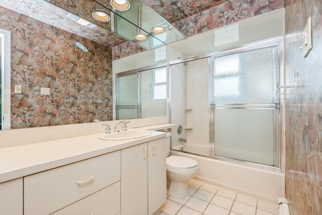 95 Nassau Ave, Plainview, NY 11803 - bathroom with toilet, tile patterned floors, enclosed tub / shower combo, and vanity
