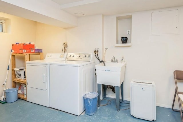 95 Nassau Ave, Plainview, NY 11803 - laundry room with washing machine and dryer and baseboards