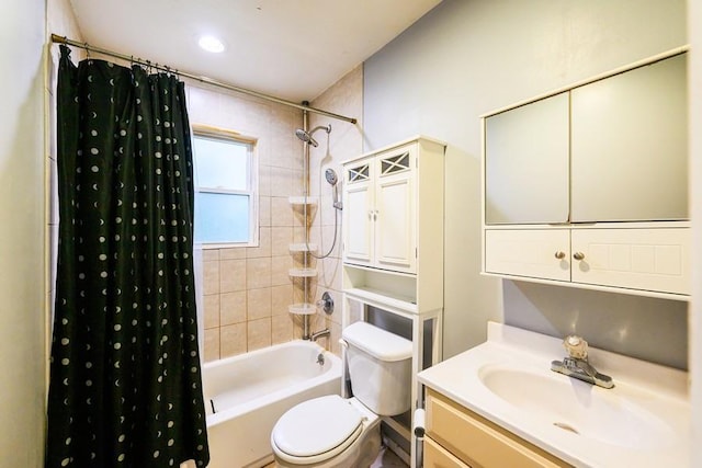 full bathroom featuring shower / tub combo, toilet, and vanity