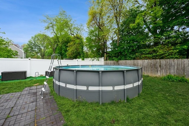 view of pool with central AC unit