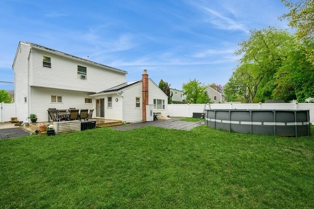 rear view of house with a patio
