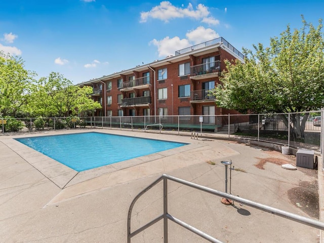10813 Seaview Ave Unit 41B, Brooklyn, NY 11236 - community pool with fence and a patio area