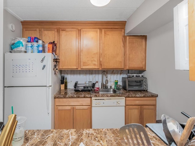 10813 Seaview Ave Unit 41B, Brooklyn, NY 11236 - kitchen featuring white appliances, a sink, backsplash, and brown cabinetry