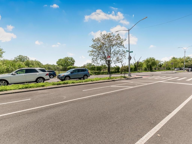 10813 Seaview Ave Unit 41B, Brooklyn, NY 11236 - view of asphalt road featuring street lighting and curbs