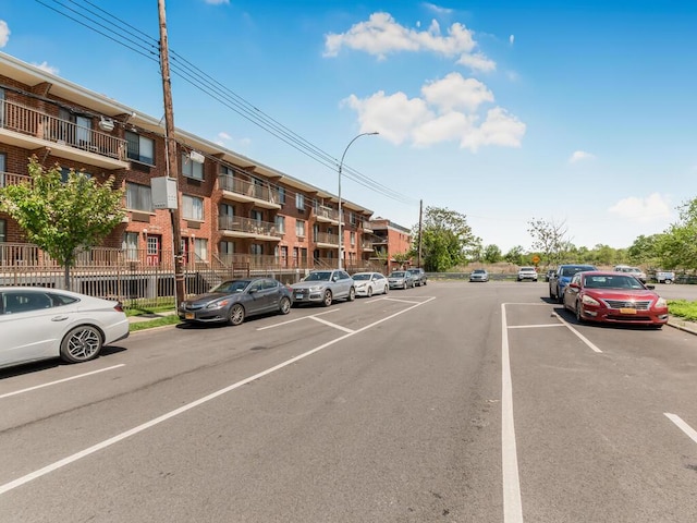 10813 Seaview Ave Unit 41B, Brooklyn, NY 11236 - view of asphalt road with street lights and curbs